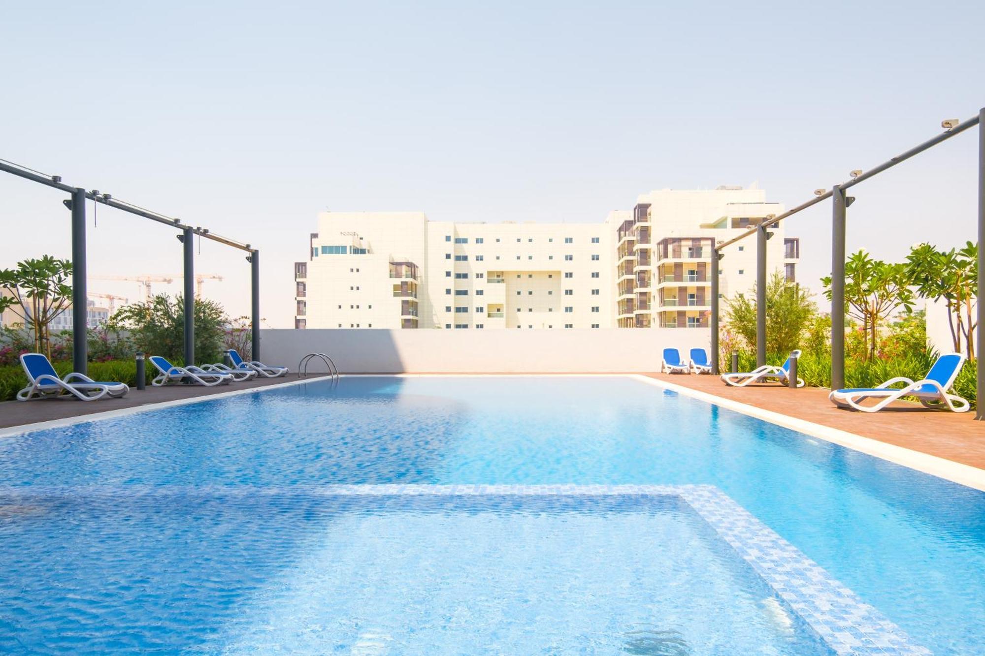 Poolside Charm Apartment Abu Dhabi Exterior foto